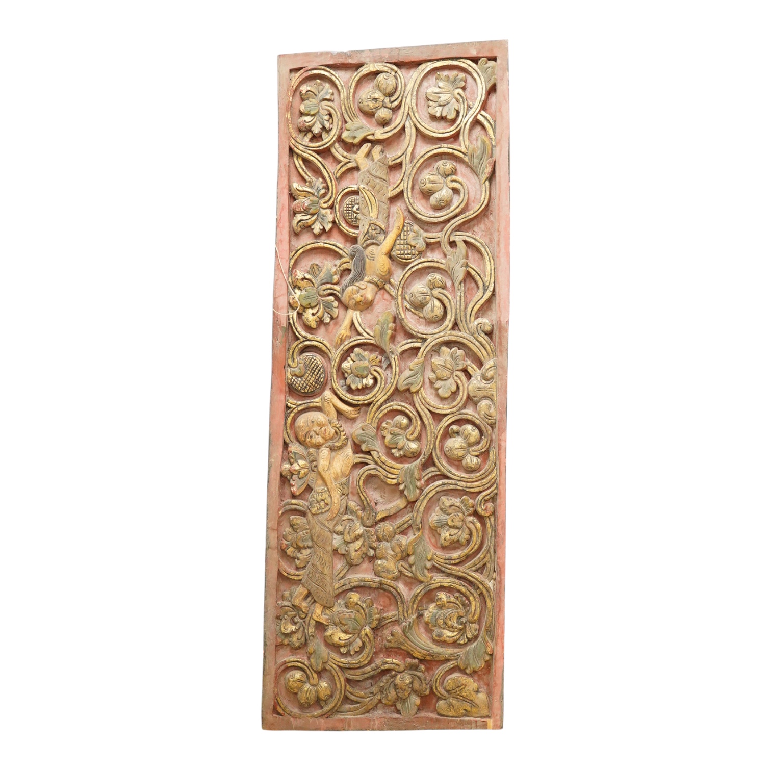 A Balinese partially gilt carved wood panel, 40 x 111cm